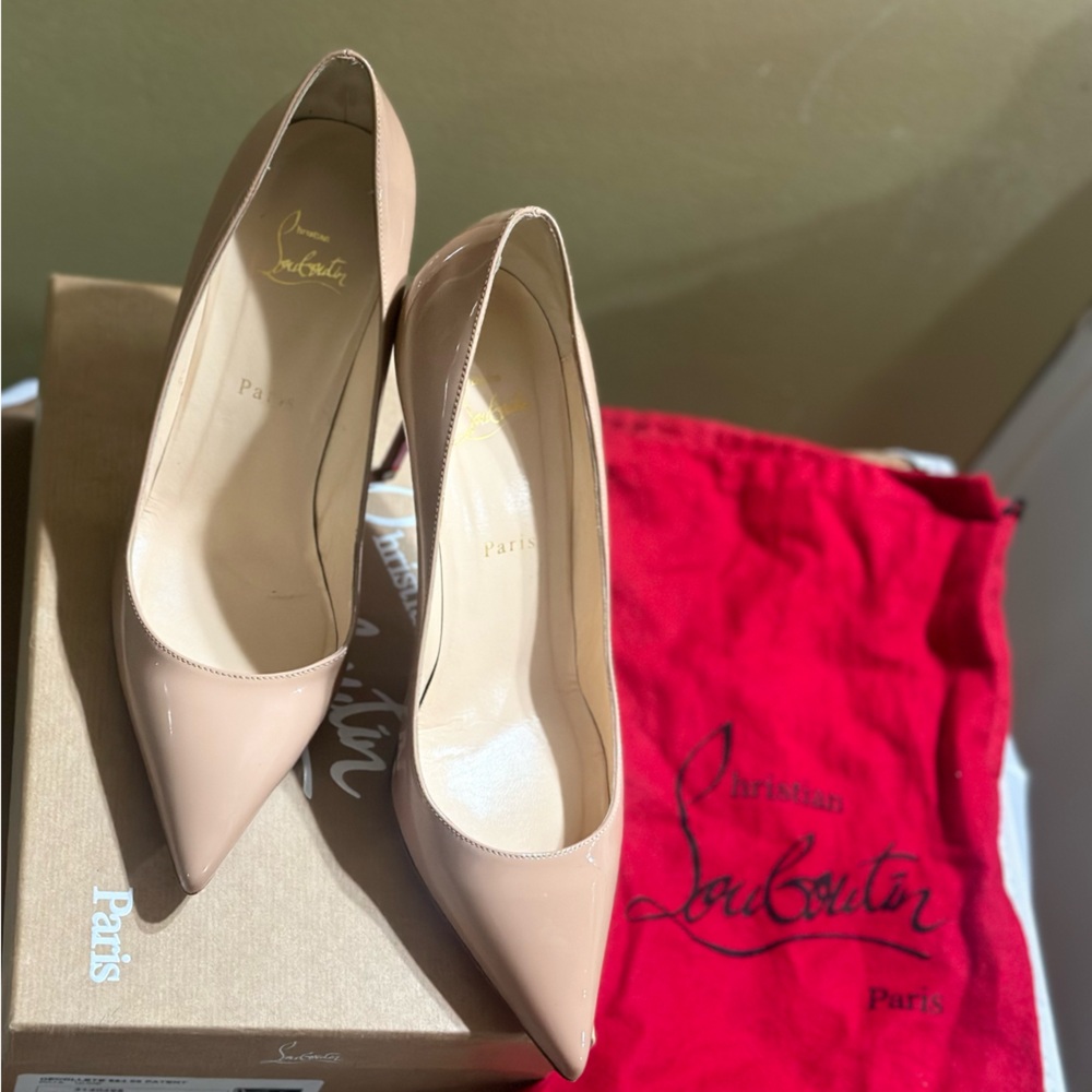 CHRISTIAN LOUBOUTIN
Decollete 554 85 Patent Leather Nude Pumps
